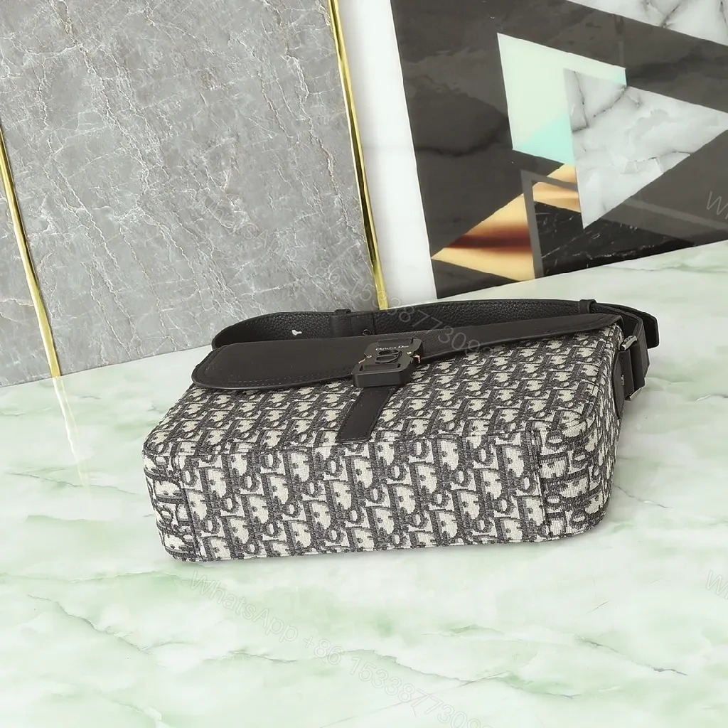View 2 of Texture-Black Leather & Canvas Crossbody with Monogram Pattern, Compact, Everyday Luxury Bag
