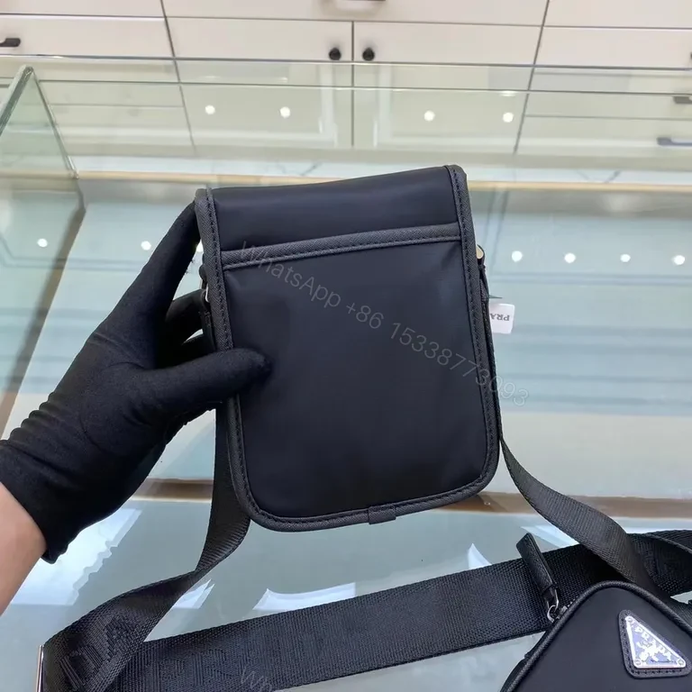 View 4 of Prada Black Nylon Crossbody: Compact Designer Chic
