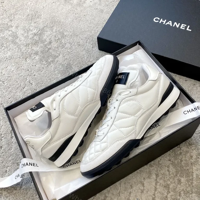 View 2 of Chanel Quilted High-Top Sneakers â€“ Luxe Comfort Urban Style