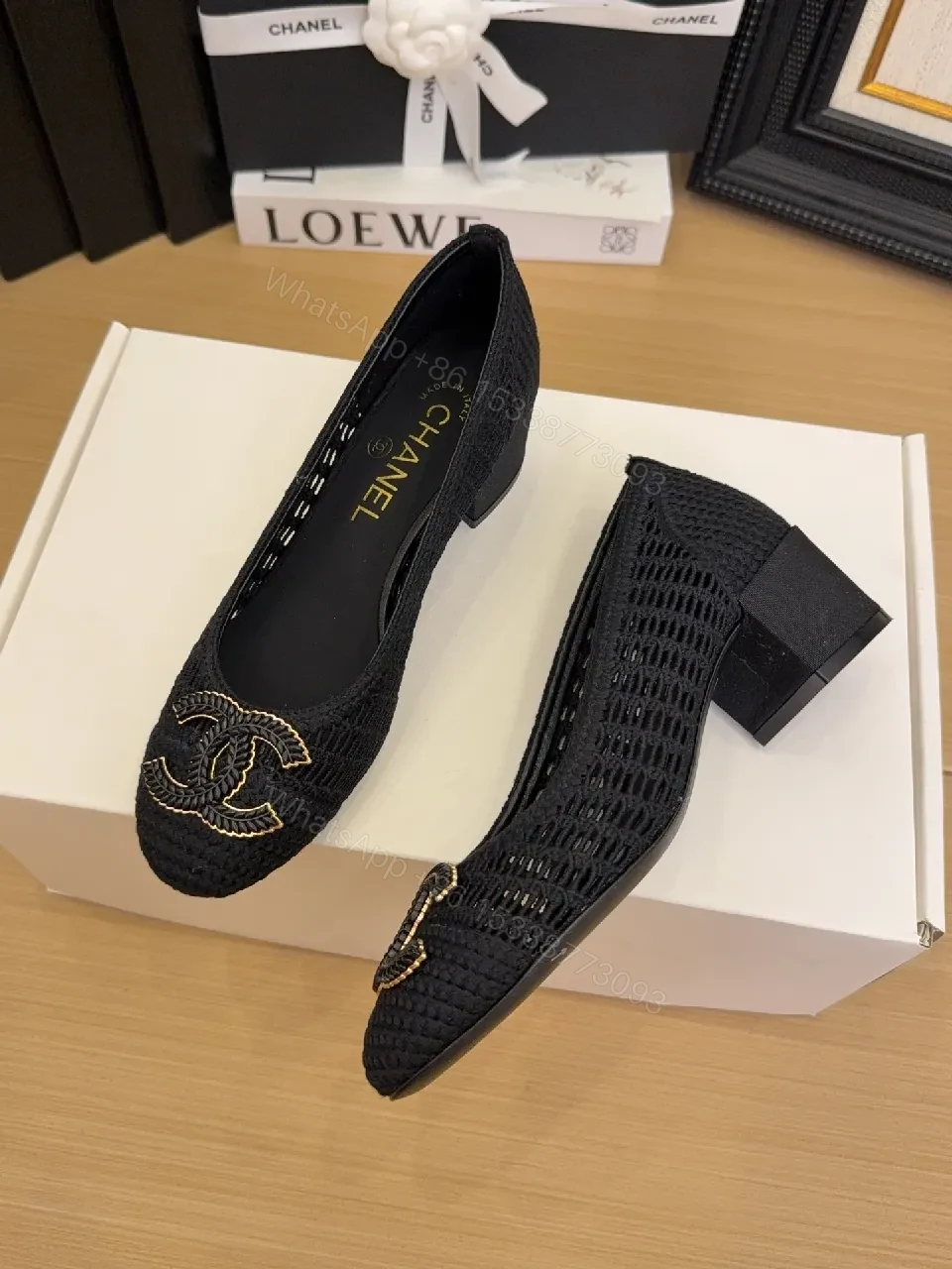 View 6 of Elegant Quilted Black Loafers with Gold Emblem: Everyday Luxury