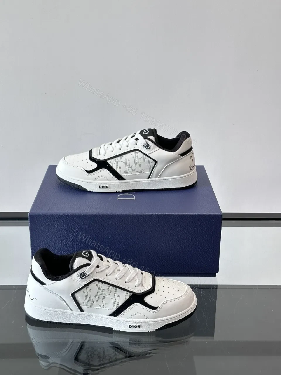 View 2 of White-Black Leather Sneaker with Graphic Texture, Cushioned Comfort