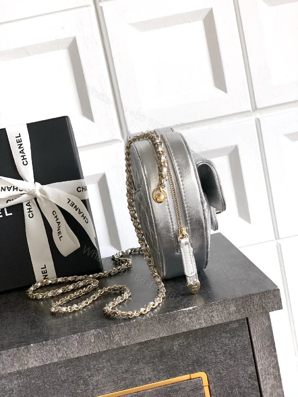 View 6 of Heart-Shaped Quilted Metallic Bag with Gold Hardware