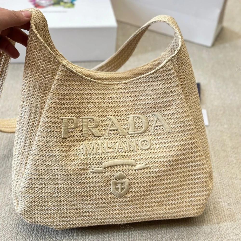 View 2 of Prada Logo Embossed Raffia Shoulder Bag Beige 33Cm 1BC186VOUO2A2T