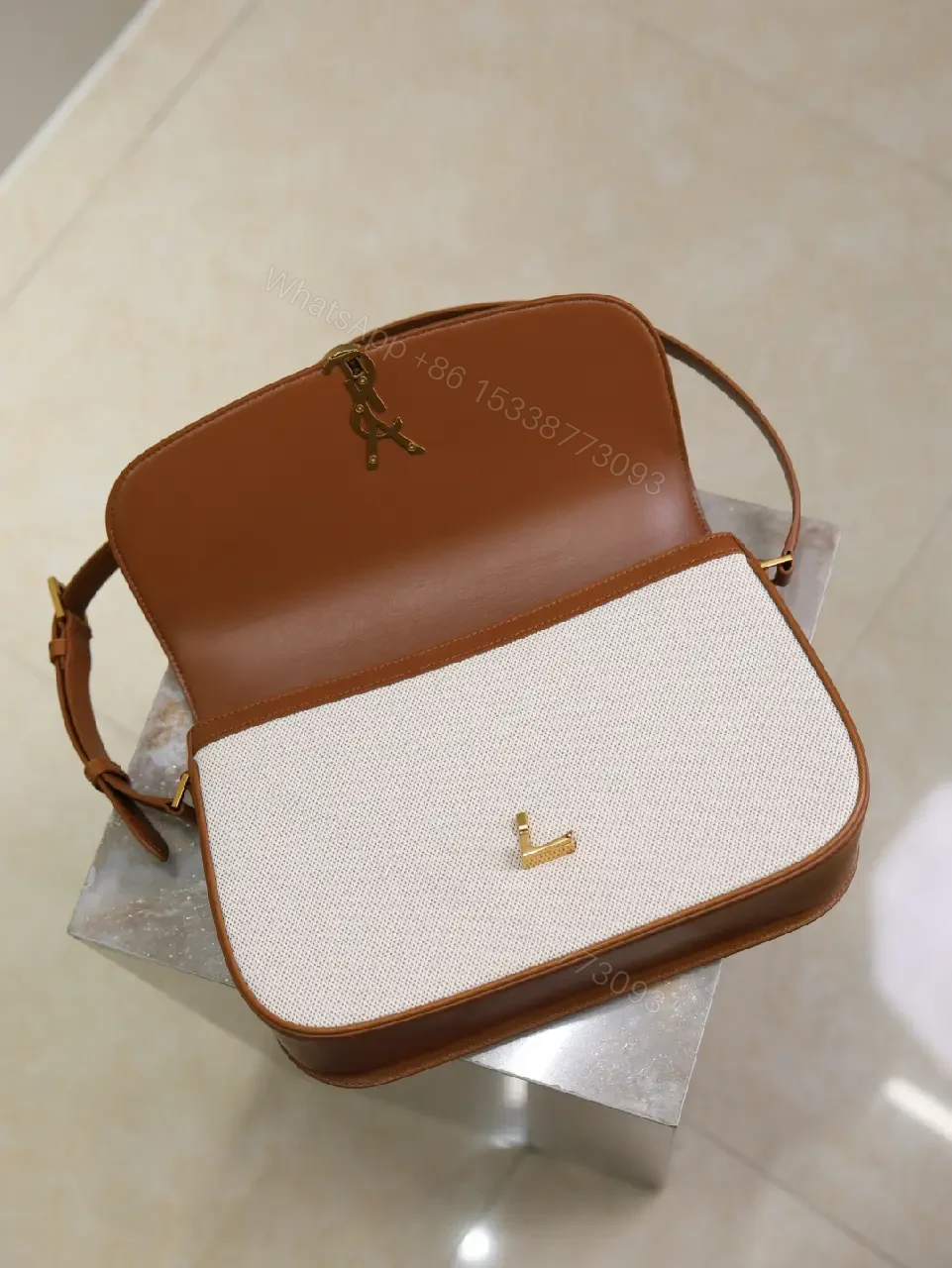 View 7 of Textured Crossbody Bag: Gold Hardware, Leather Trim, Chic Modern