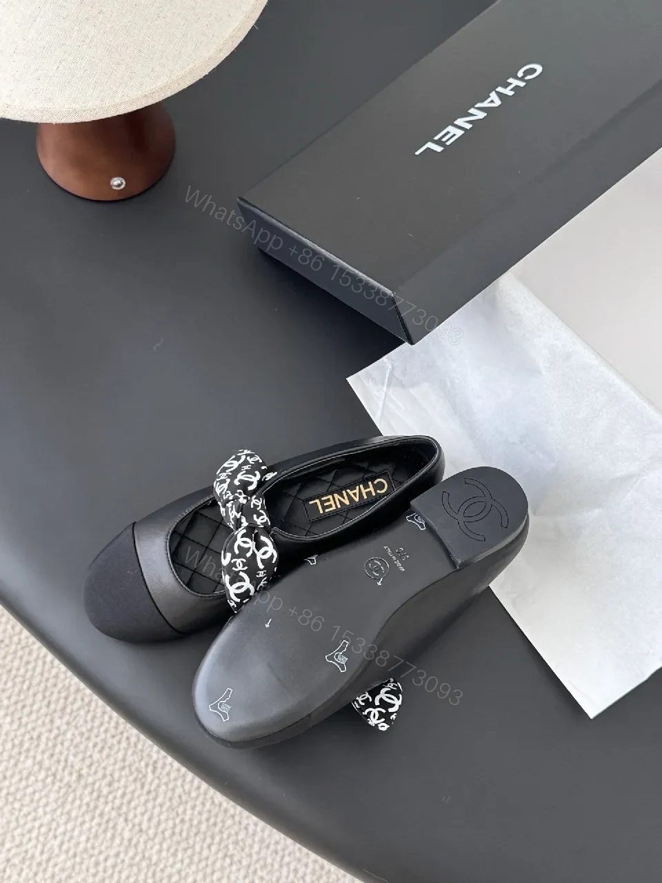 View 3 of Black Quilted Ballet Flats with Logo Bow - Chic, Comfortable Flats