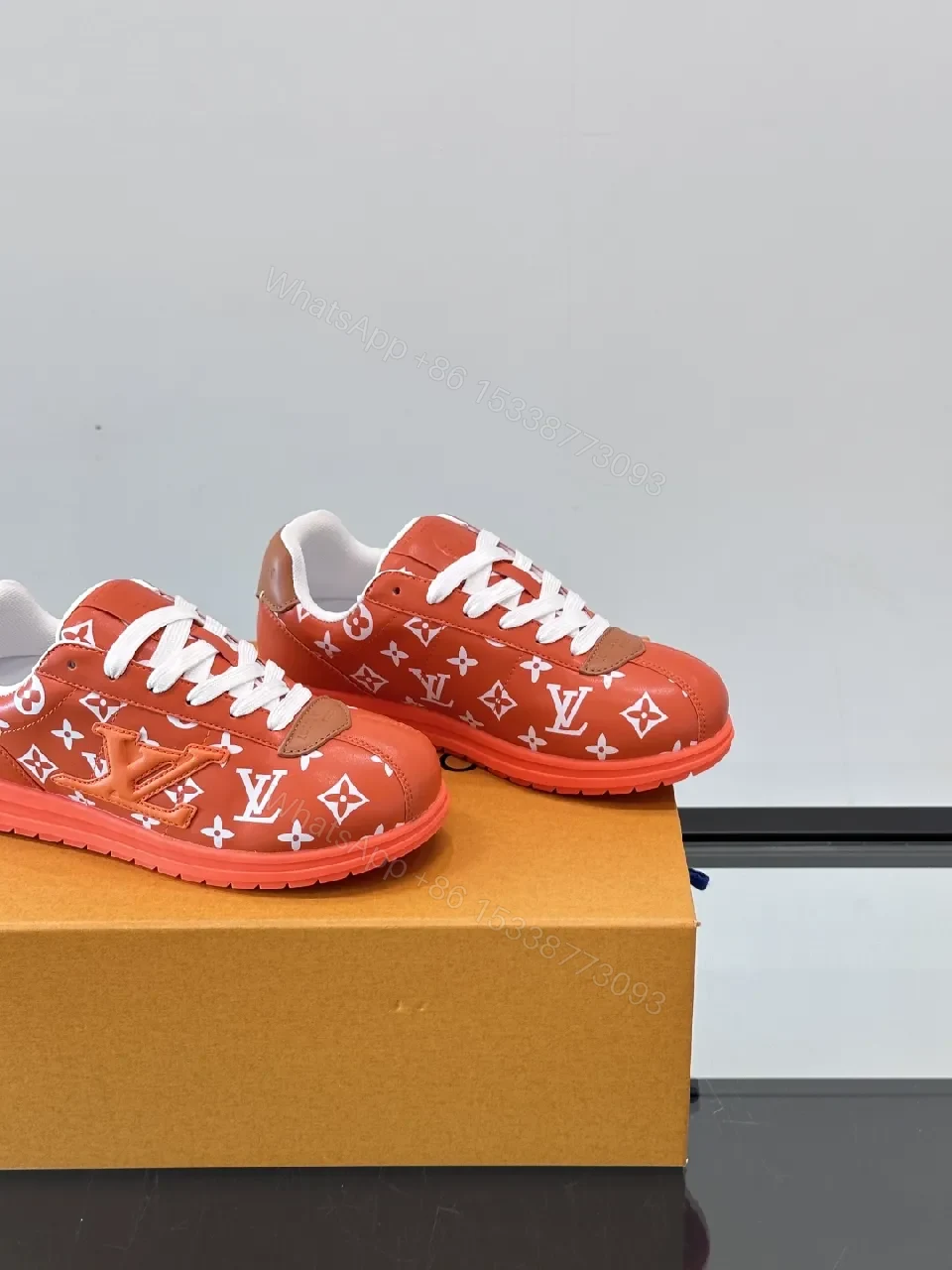 View 3 of Bold Orange-Red Monogram Sneaker: Luxe Designer-Inspired High-Tops