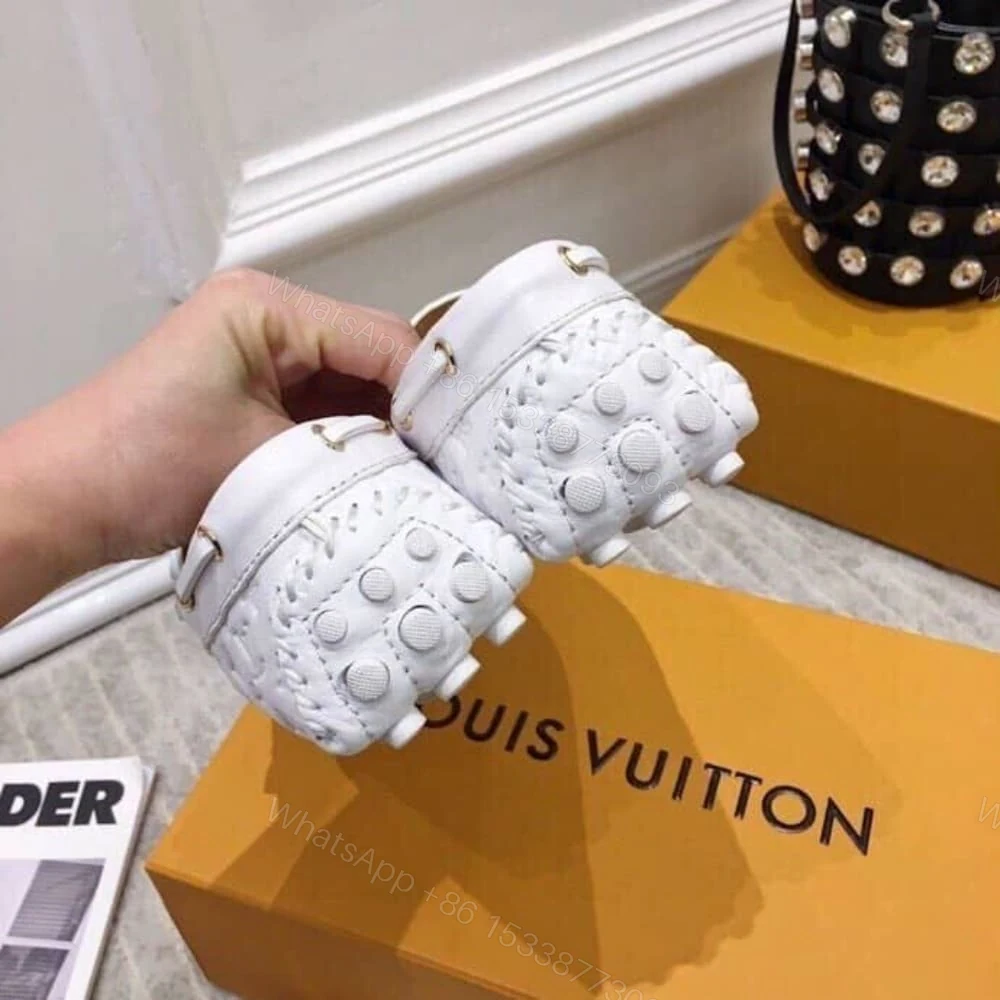 View 6 of LOUIS VUITTON WHITE MONOGRAM EMPREINTE LEATHER GLORIA LOAFERS