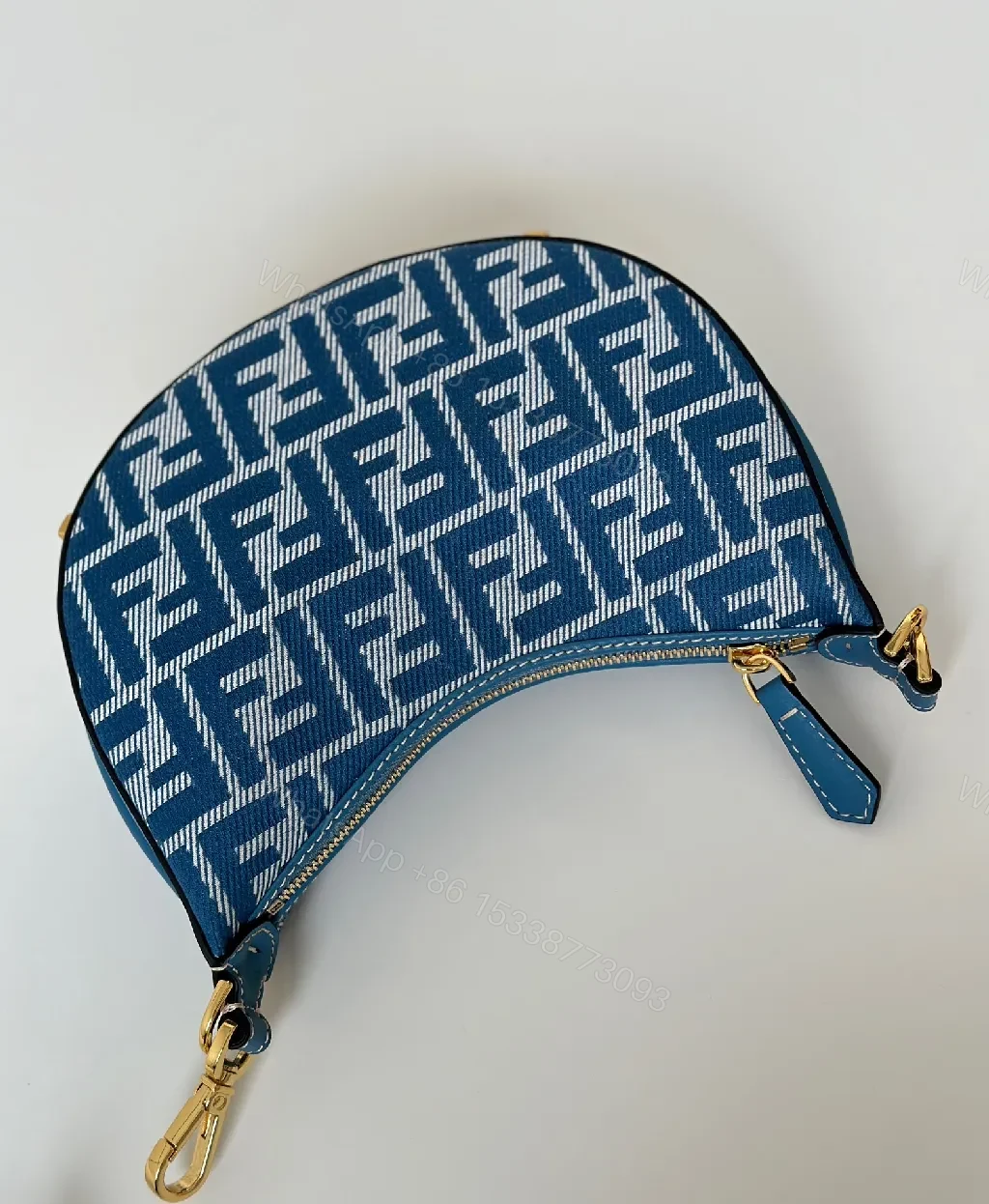 View 7 of Blue Monogram Hinge Bag in Signature Pattern - Everyday Luxury Bag