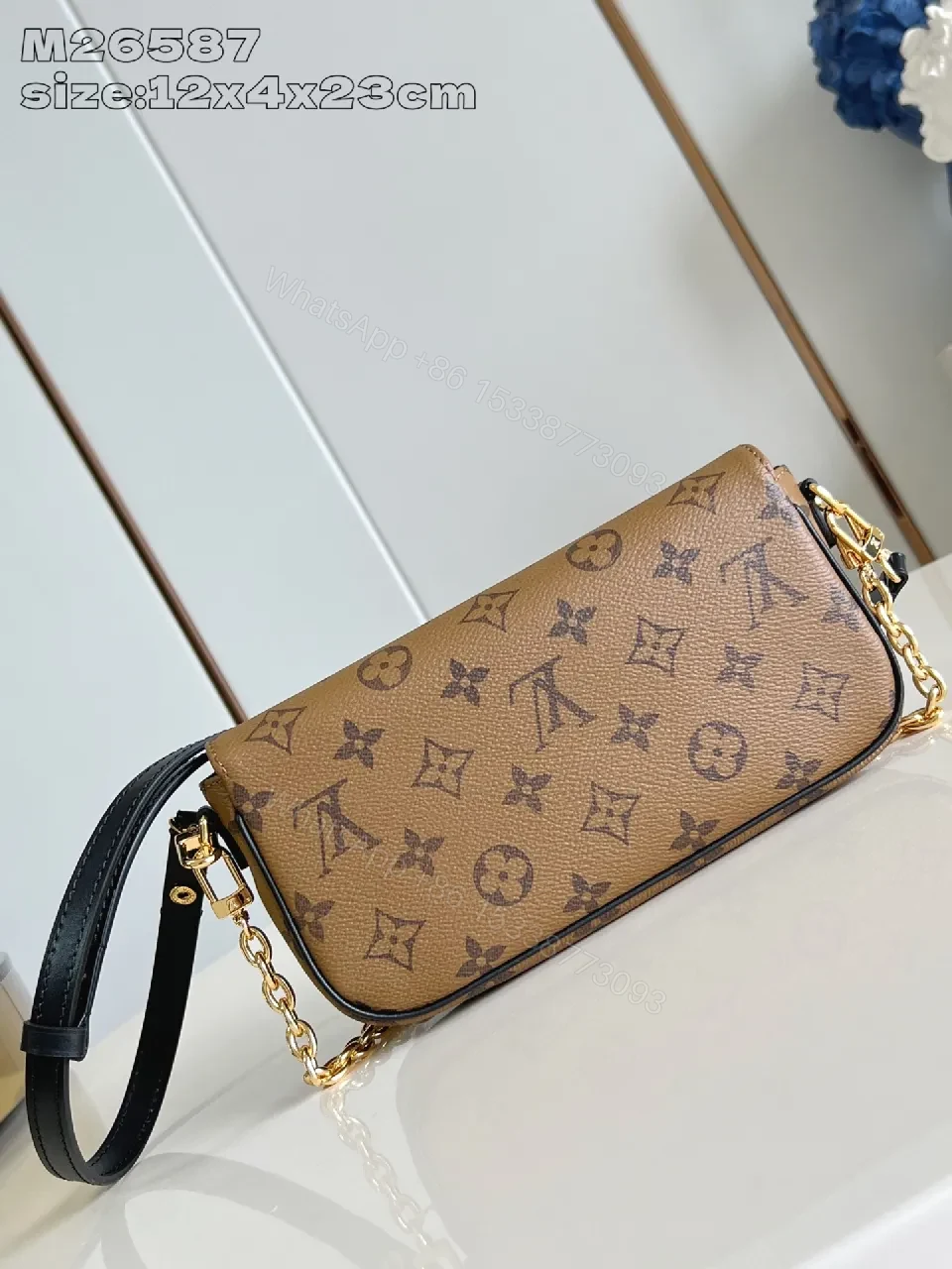 View 2 of Compact Dual-Tone Monogram Messenger: Subtle Luxury Bag