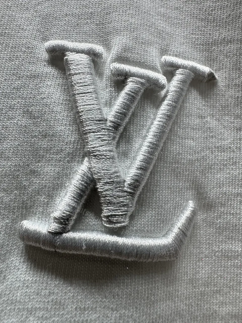 View 10 of Premium White Cotton Tee with Subtle Embroidered Accents