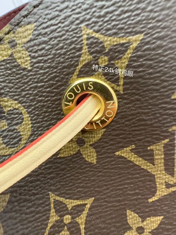 View 7 of Elegant Monogram Barrel Bag â€” LV Canvas, Leather Trim, Adjustable Strap, Day-to-Night Luxury