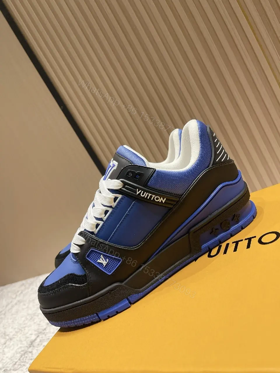 View 2 of Textured Blue-Black Leather High-Tops with Bold Detailing