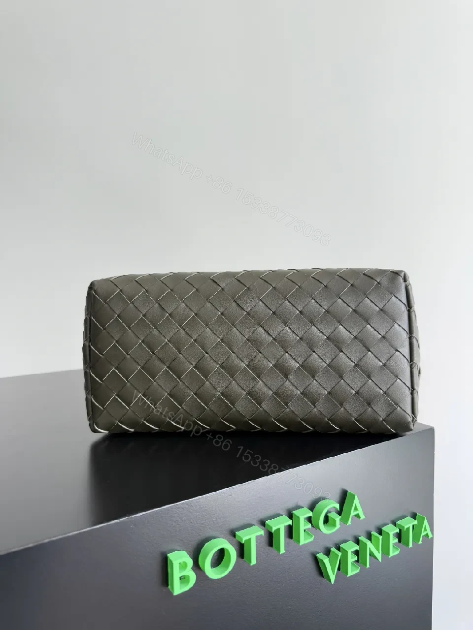 View 2 of Chic Texture Crossbody: Woven Leather, Sculpted Hardware, Compact Style