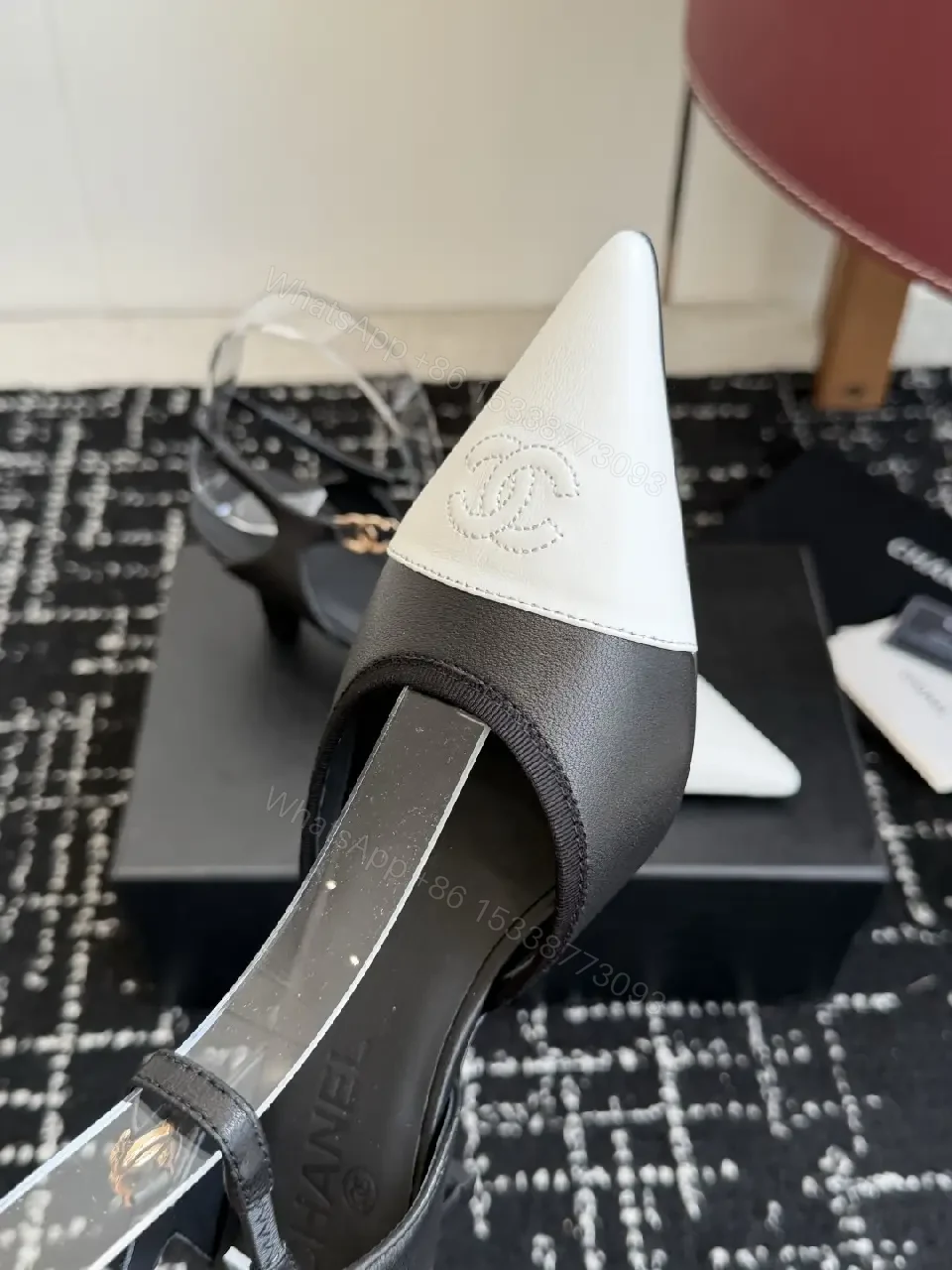 View 9 of Black White Leather Slingback Heels with Chanel Logo, Pointed Toe, 2-inch Heel
