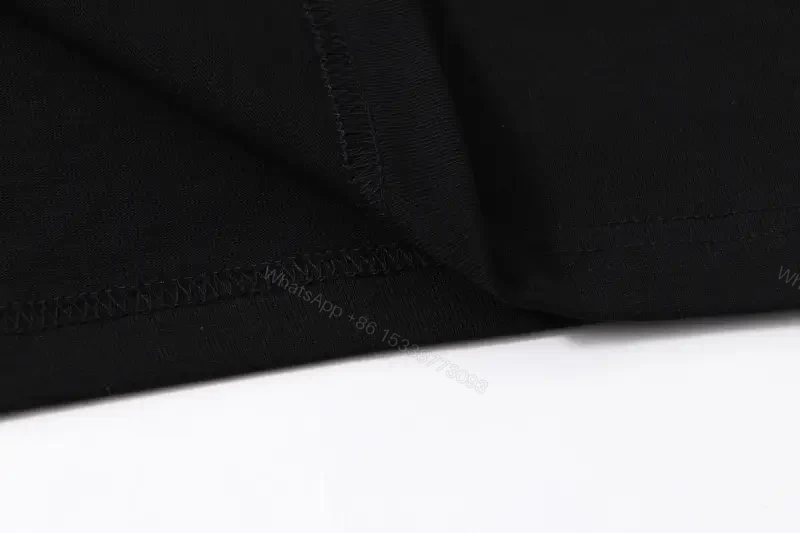 View 9 of Dark Black Cotton Tee with Off-White Logo Print – Relaxed Fit Shirt