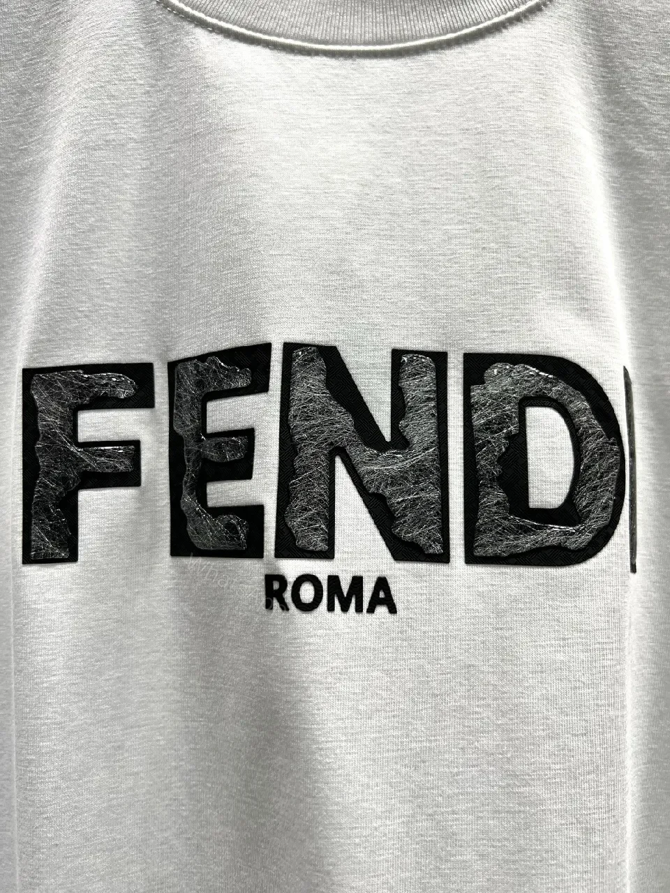 View 6 of White Cotton Logo Tee - Minimalist Luxury, Relaxed Fit, Front Fendi-Inspired Emblem
