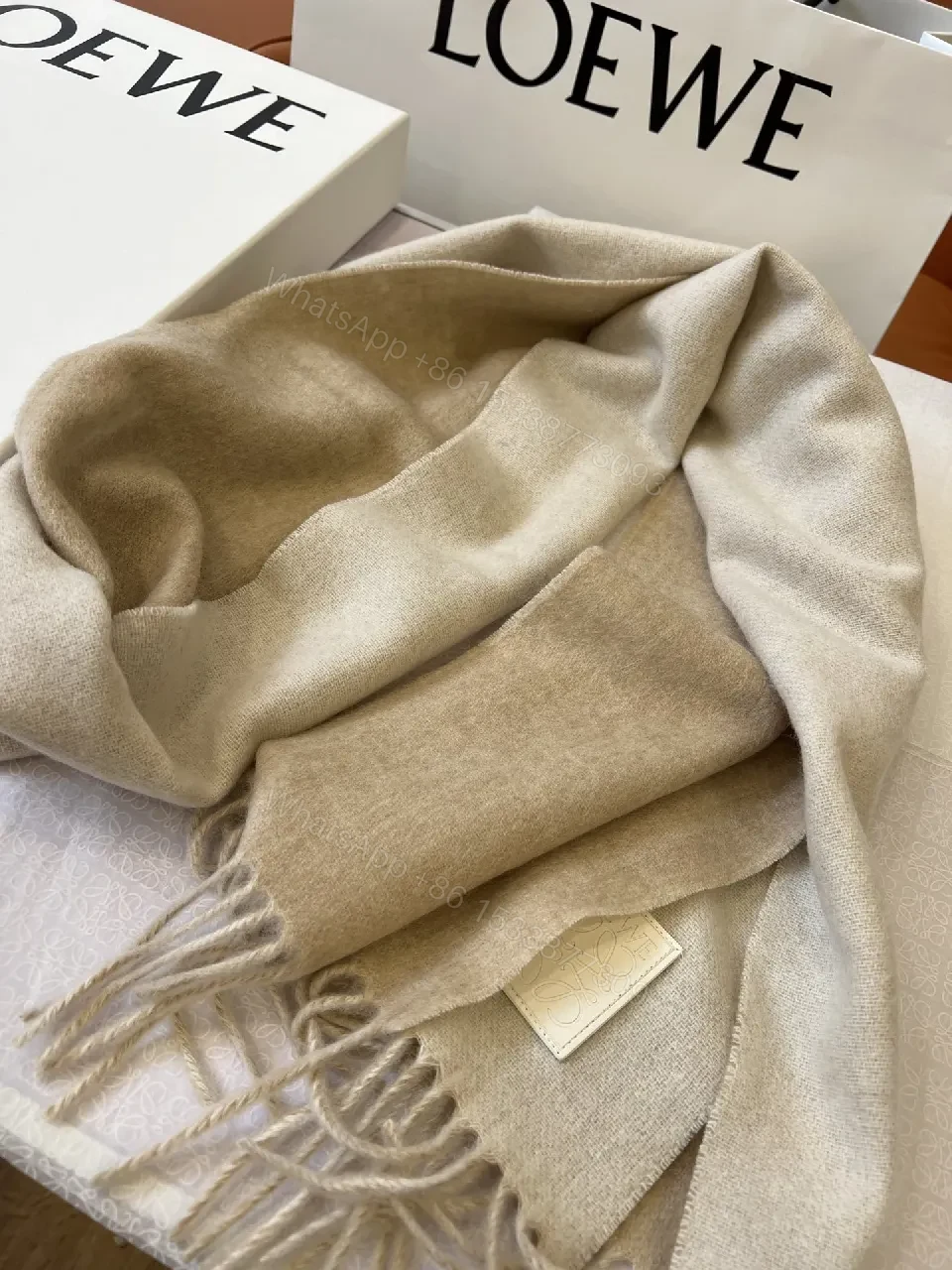 View 3 of Neutral Wool-Blend Scarf: Subtle Pattern, Elegant Fringe