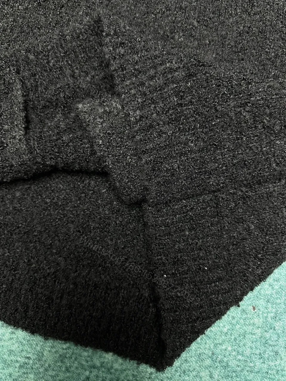 View 5 of Cozy Textured Cardigan: Black Knit with Logo Accent + Everyday Luxury Cardigan