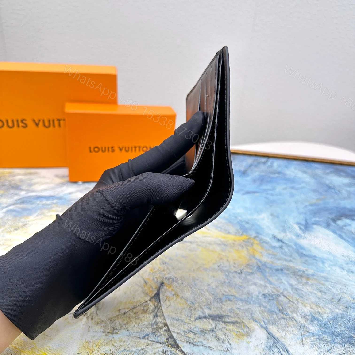 View 8 of LOUIS VUITTON MULTIPLE WALLET BLACK 11CM M30295