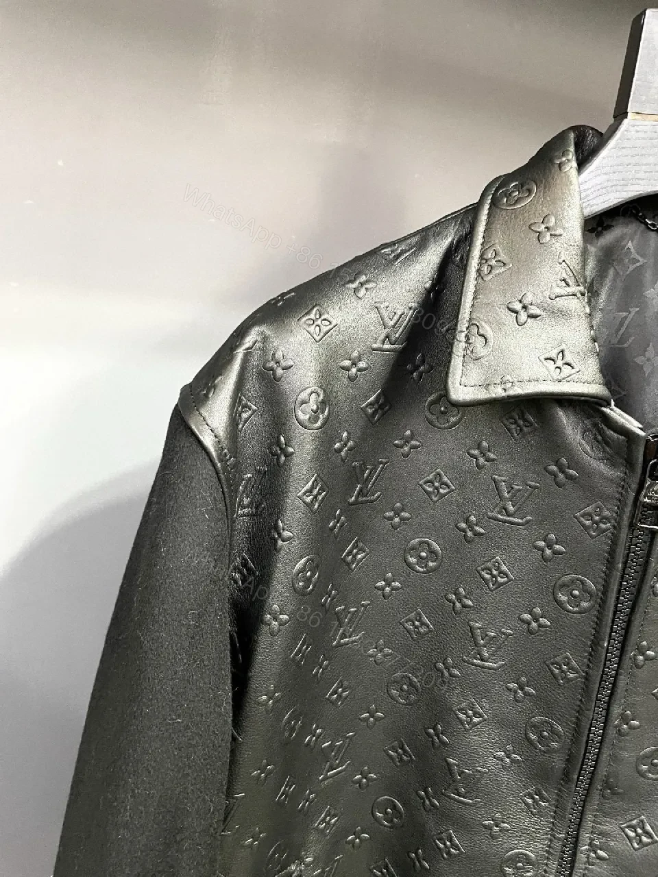 View 6 of Monochrome Leather-Embossed Varsity Jacket: Luxe Texture