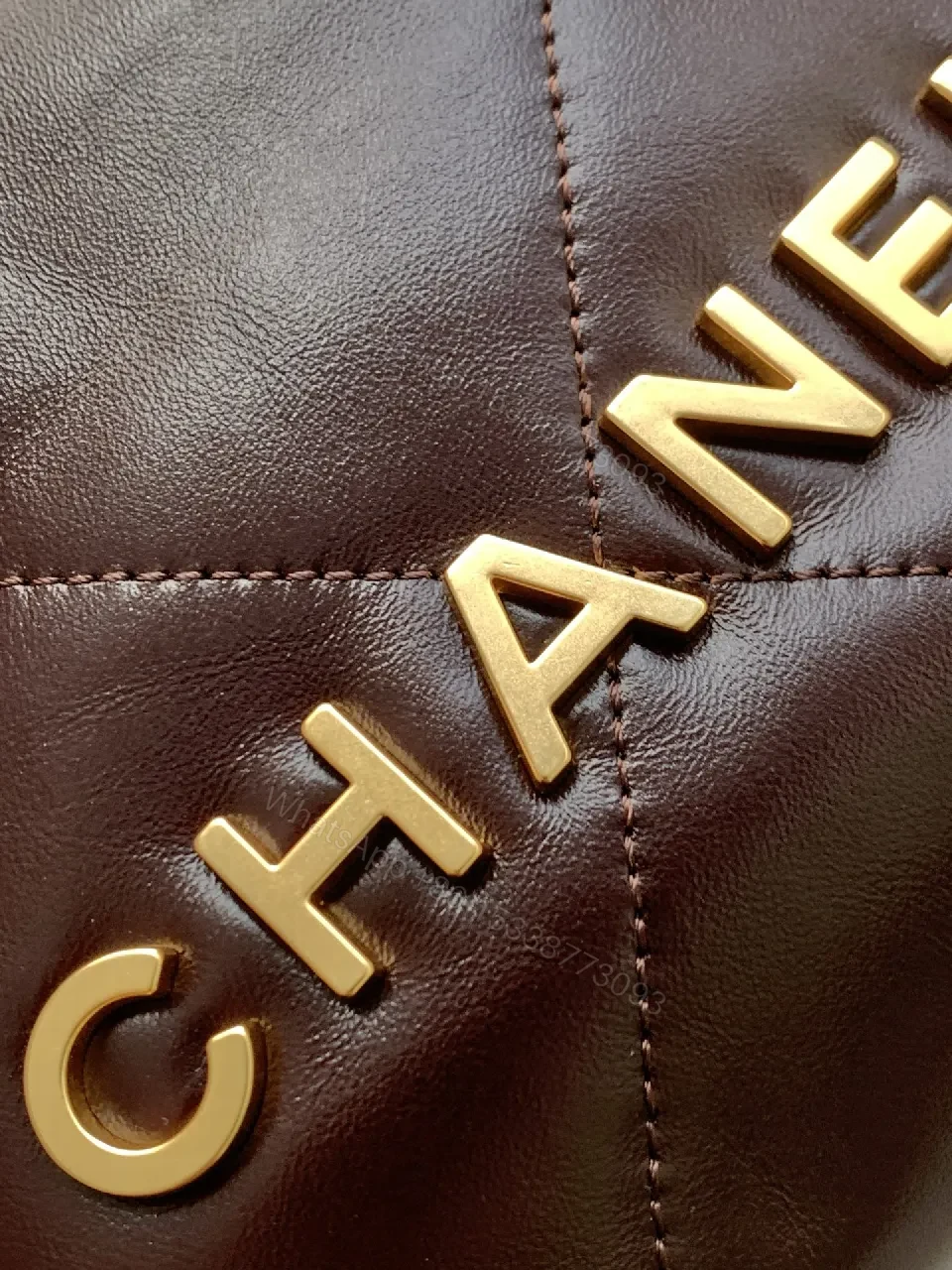 View 4 of Gold-Traced Quilted Bucket Bag: Luxury Leather, Iconic Hardware