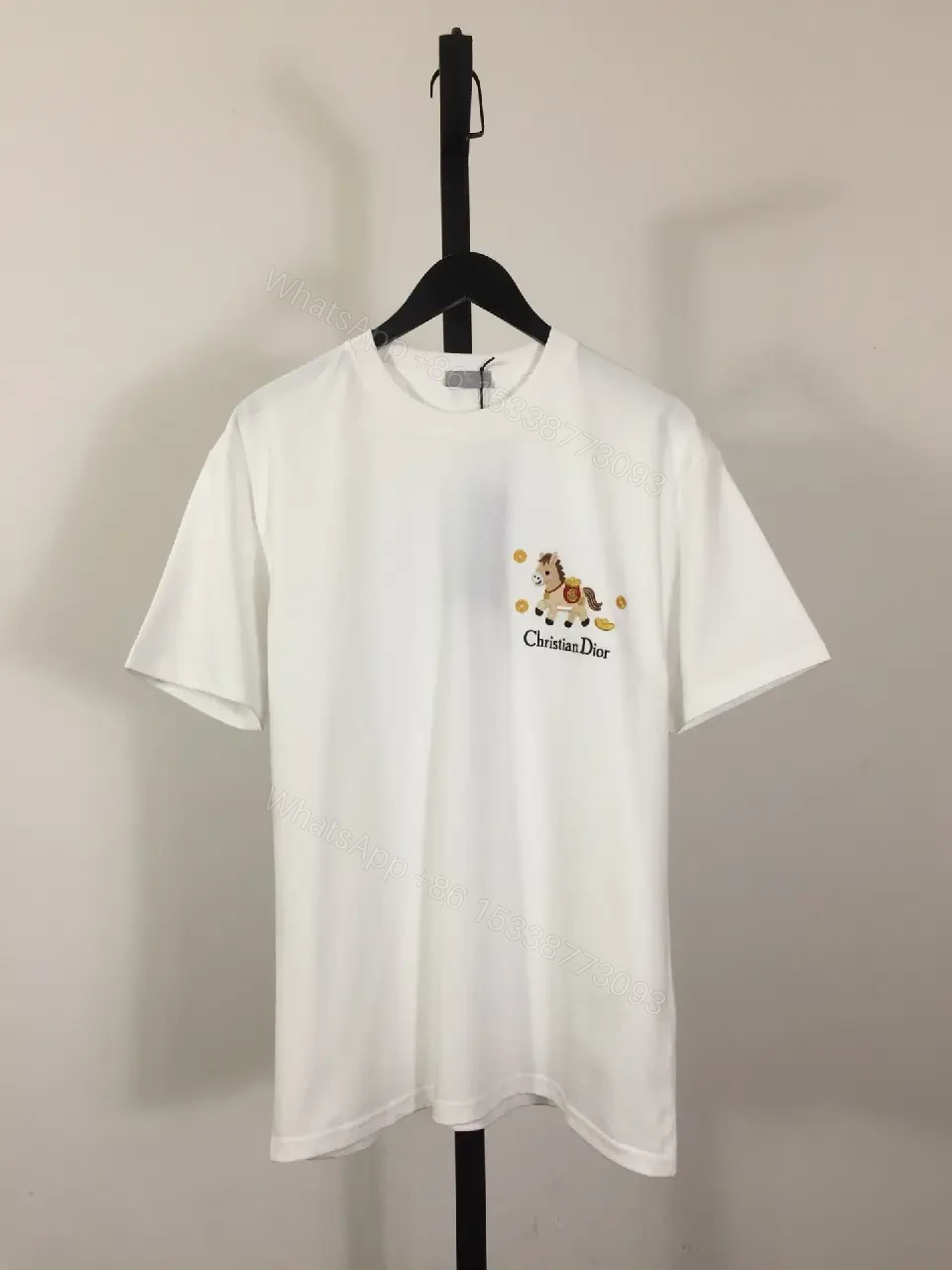 White Cotton Tee with Embroidered Pony – Subtle Luxury Style — view 1