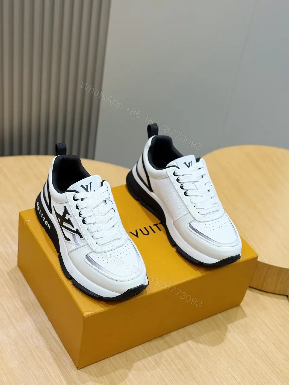 White & Black Leather High-Tops with Luxe Detailing — Everyday Couture — view 1