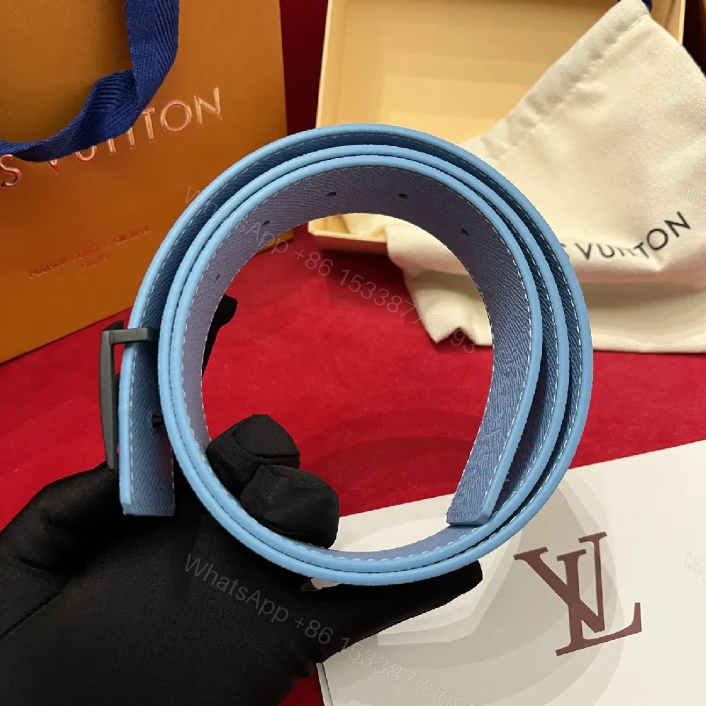 View 5 of Soft-Blue Monogram Belt: Textured Leather, Modern Silhouette, Everyday Luxury