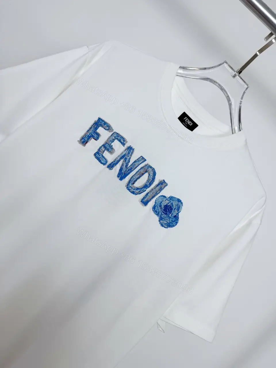 View 9 of Lightweight White Cotton Tee + Embroidered Blue Logo + Minimalist + Designer Flair + T-Shirt