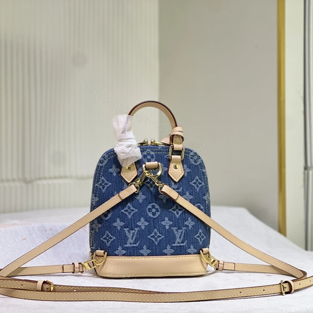 View 5 of Louis Vuitton Alma Backpack Blue Denim 20Cm