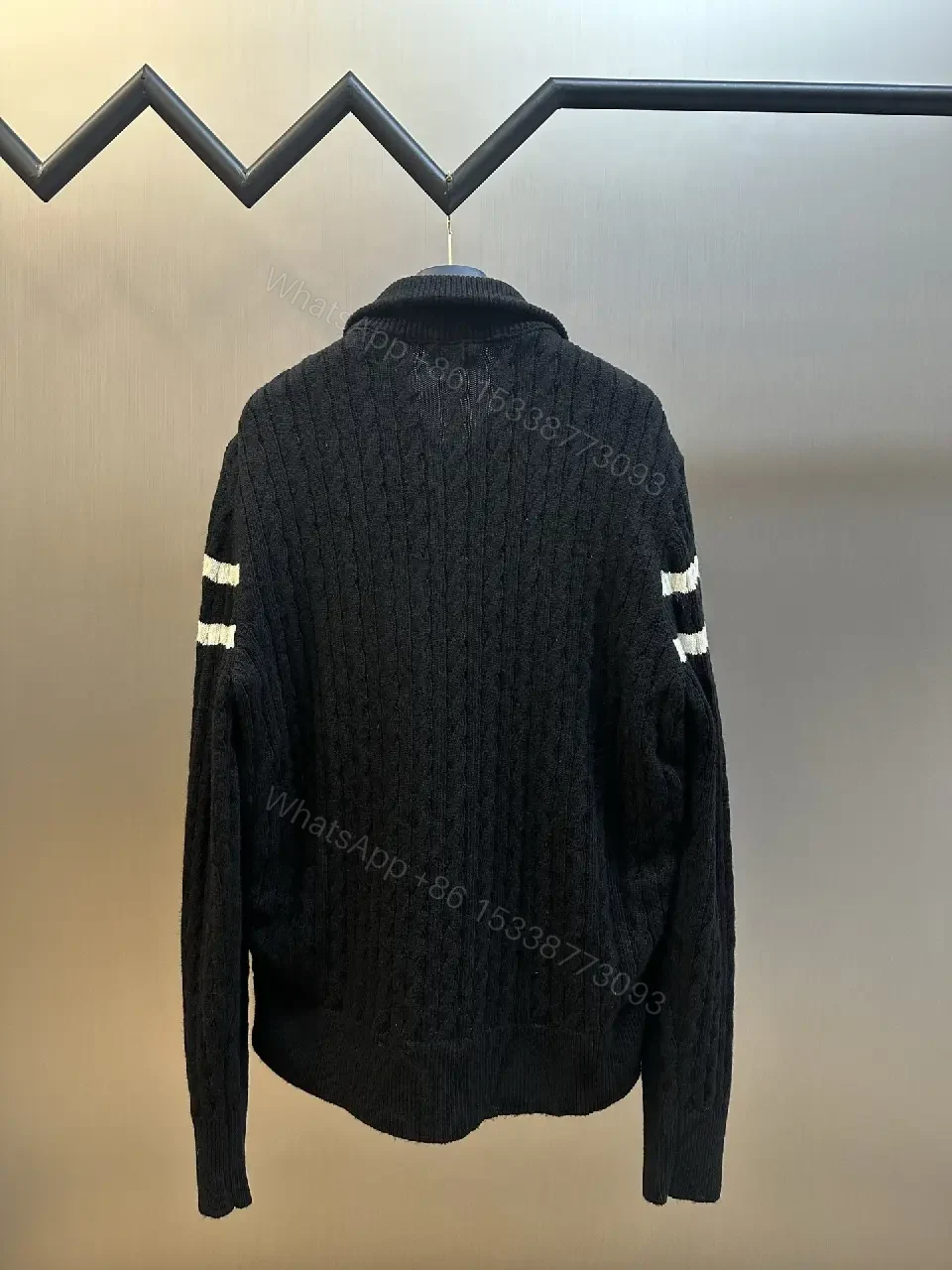 View 6 of Tech-Inspired Quilted Jacket with Knit Sleeves - Versatile Outerwear