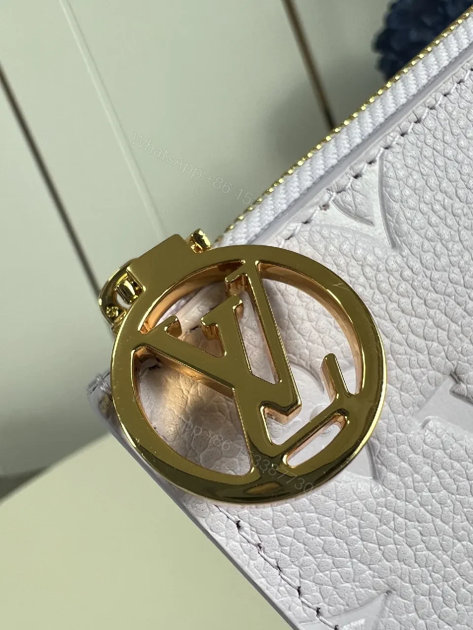 View 6 of Soft Monogram Wallet: Gold LV Charm, Compact Luxury, Leather