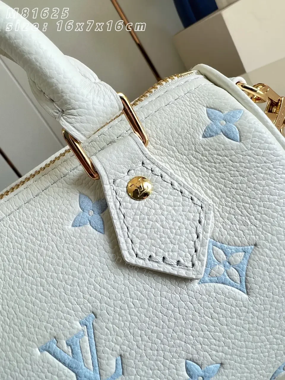 View 2 of Soft White Mini Satchel – Textured Leather, Light Blue Accents, Luxury Everyday Carry
