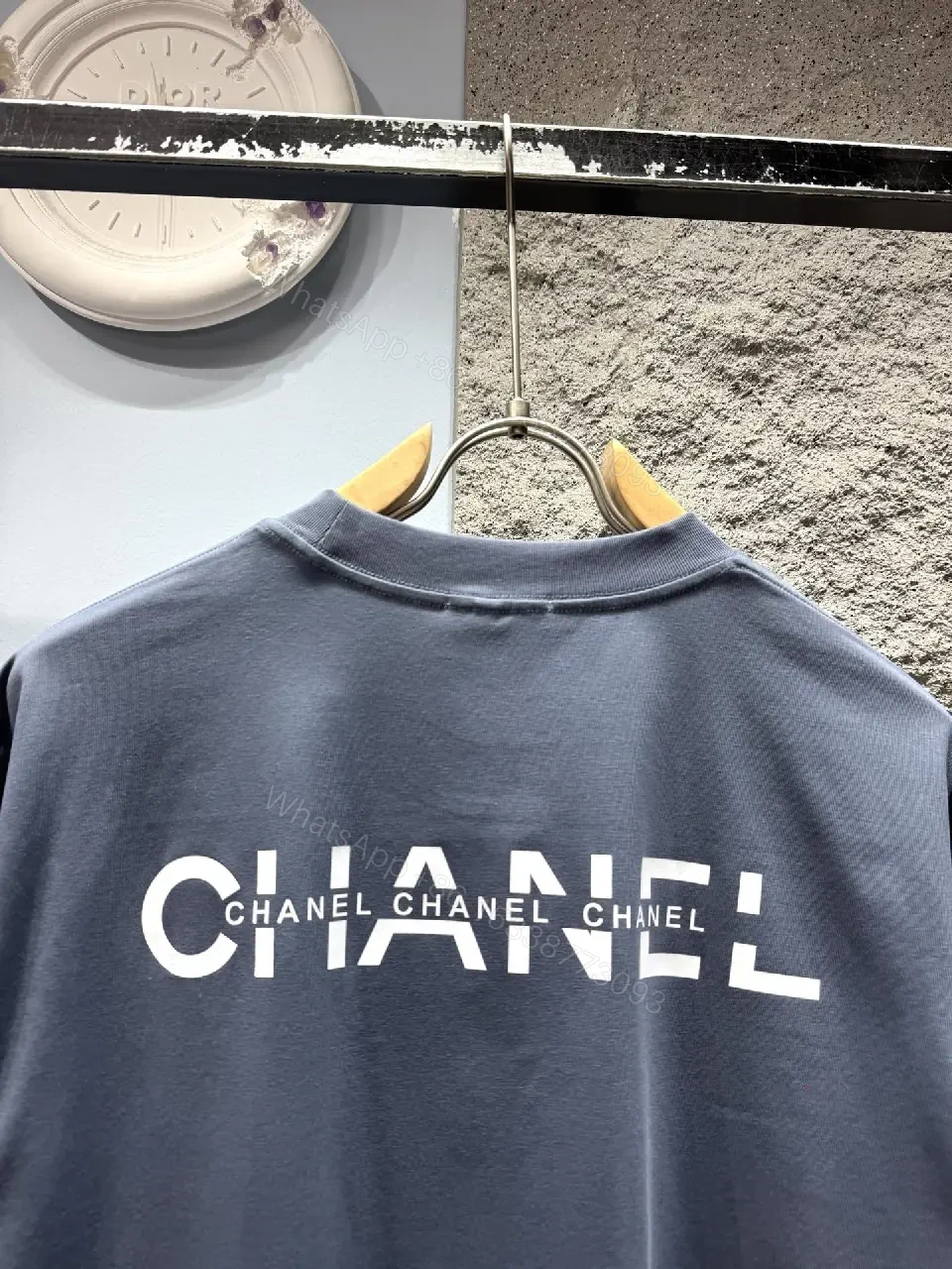 View 10 of Navy Knit Tee: Subtle Crest, Luxe Texture, Relaxed Fit Top