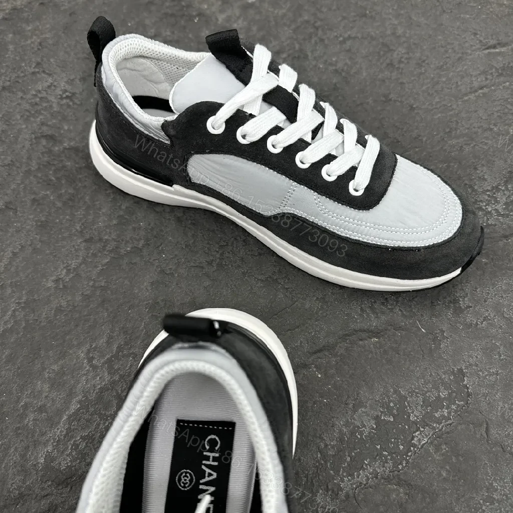 View 3 of Black and White Suede Nubuck Leather High-Top Sneaker with Signature Logo Embossment
