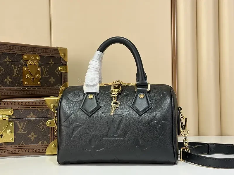 Black Pebbled Leather Dome Handbag with Gold Details — view 1