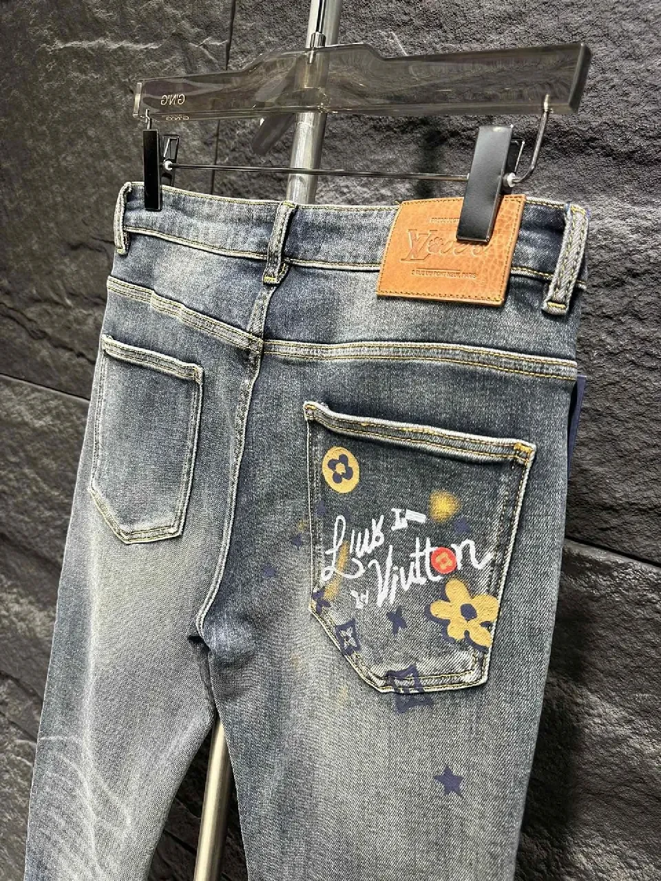 View 8 of Distressed Indigo Jeans with LV-Inspired Embellishments - Denim Luxe style