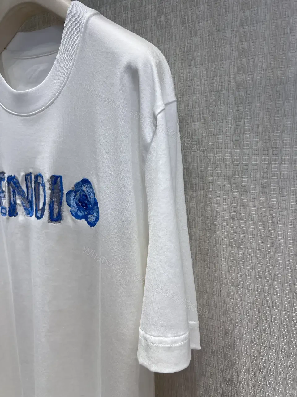 View 11 of Minimalist White Tee with Bold Embroidery: Everyday Luxe Tee