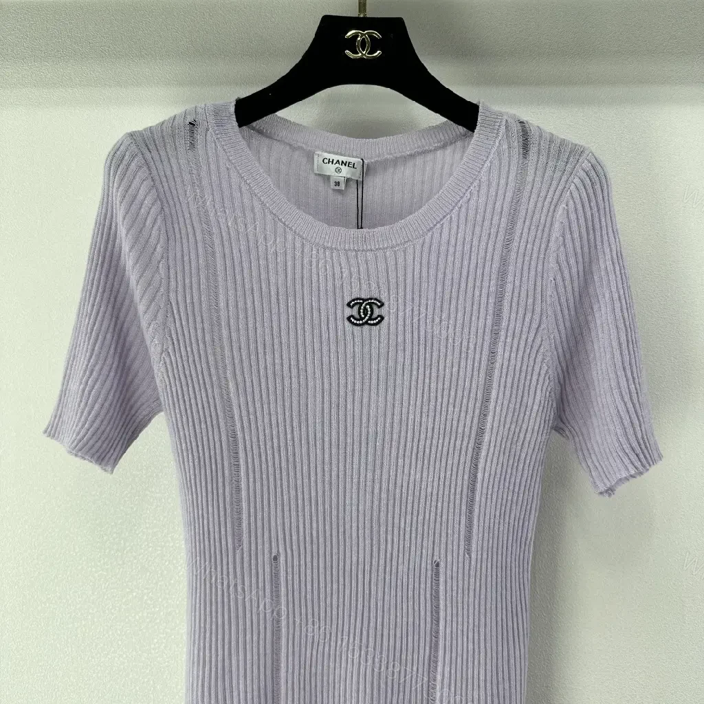 View 9 of Soft Lilac Knit Tee: Subtle Emblem, Effortless Luxury Top