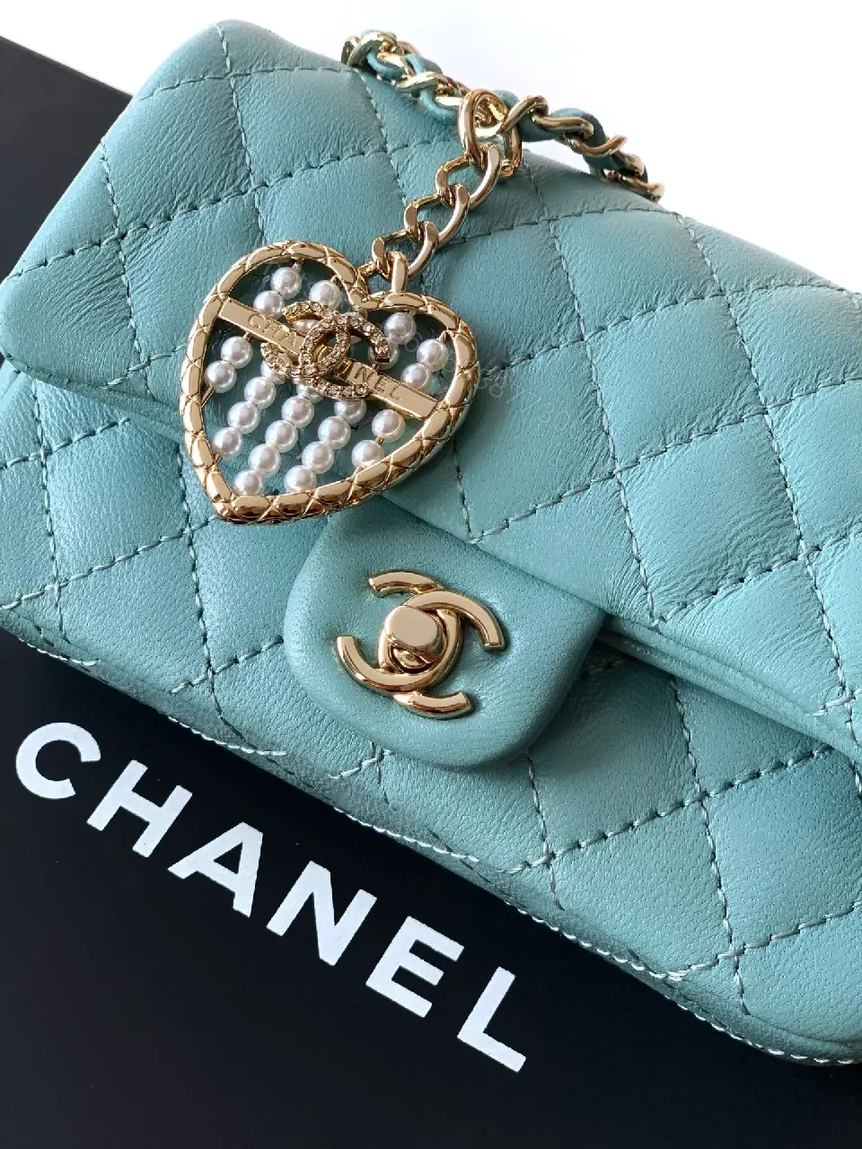 View 6 of Pastel Aqua Quilted Mini Bag with Pearl Charm (Chic)