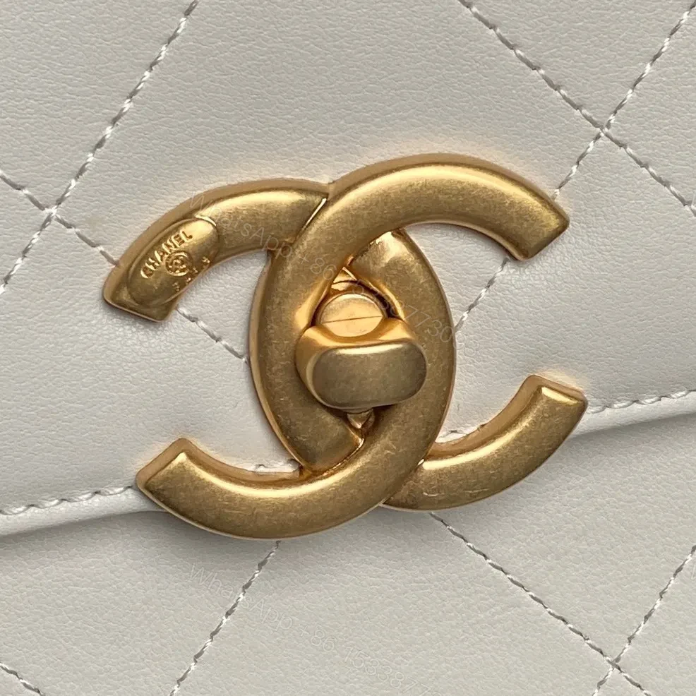 View 3 of White Quilted Mini Leather Bag with Gold Chain – Luxe Compact Style