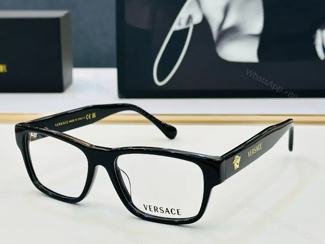 View 2 of Bold Black Acetate Square Glasses with Gold Logo Emblems