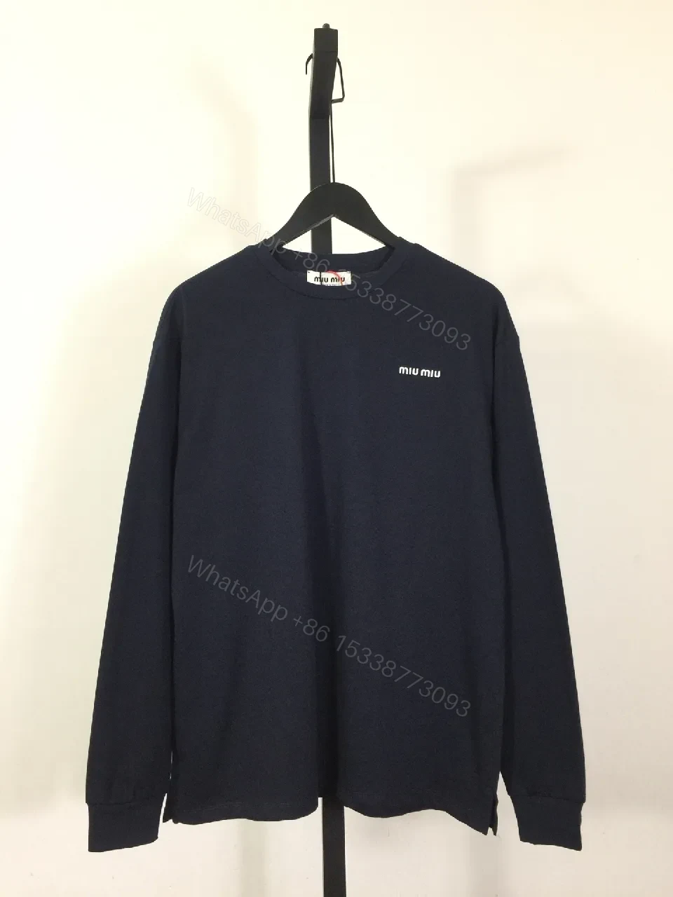 Minimalist Navy Cotton Crewneck Sweatshirt with Subtle Logo — view 1