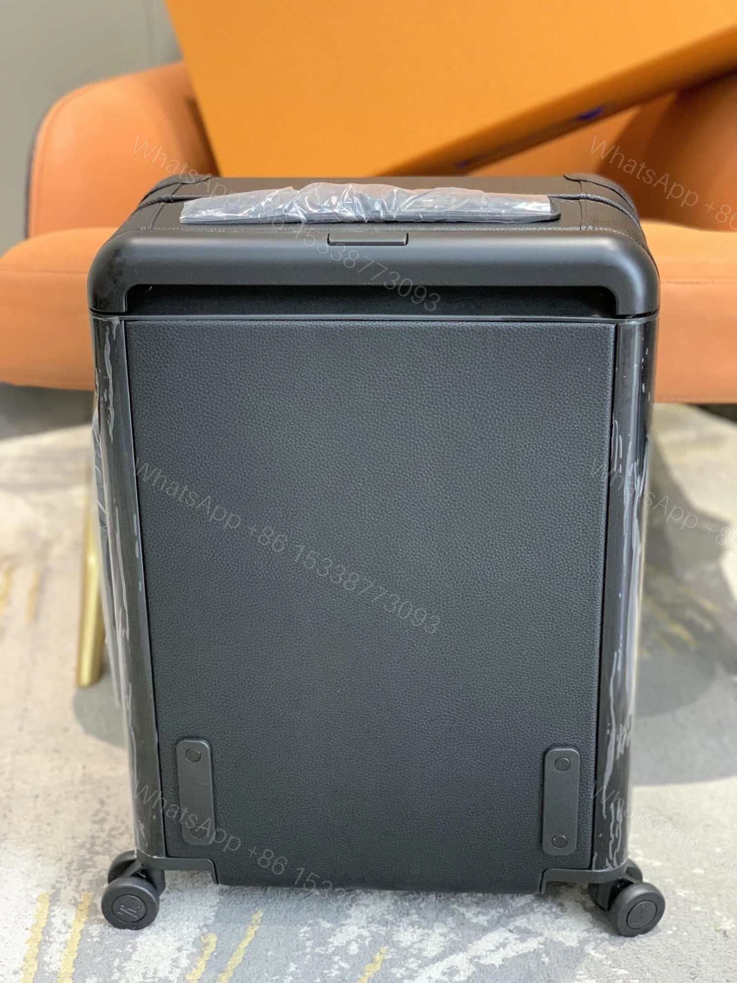 View 8 of Louis Vuitton Horizon 55 Suitcase Grained Leather Black 55Cm M10240