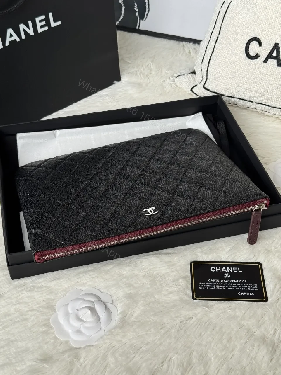 View 3 of Quilted Black Leather Wallet with Red Zip - Minimalist Luxe