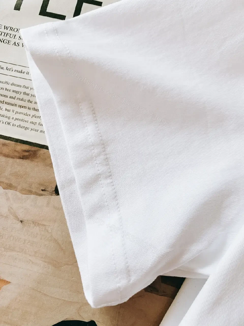 View 5 of Bold Cotton Tee + Graphic Logo + Casual Luxe + High-Contrast Graphic + T-Shirt