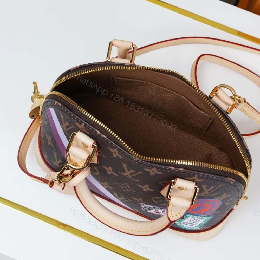 View 6 of Louis Vuitton Alma BB Mon Monogram Brown 23Cm