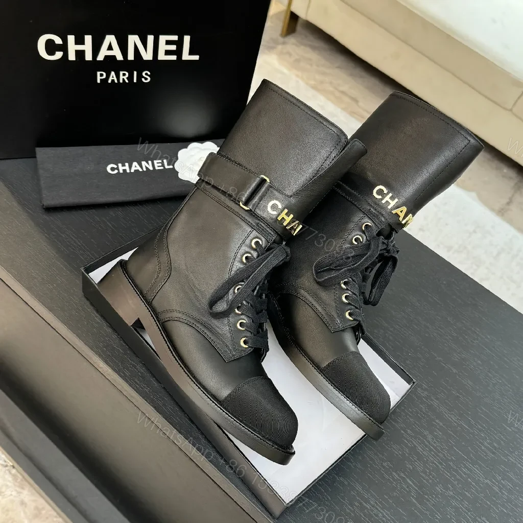 View 6 of Chic Black Combat Boots with Gold Detailing - High-Top Style