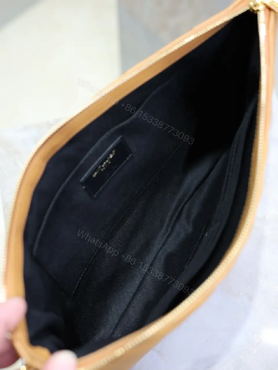 View 7 of Quilted Leather Chevron Clutch with Wrist Strap - Day-to-Night Carry
