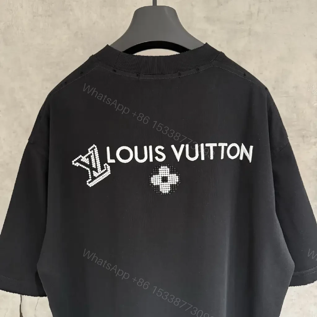 View 6 of Oversized Black Knit Tee, Luxury Crest Embroidery, Casual Comfort
